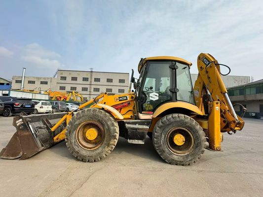 Oryginalny brytyjski używany ładowarka JCB 4CX z czterema w jednym wiadrze / używany ładowarka JCB na gorąco