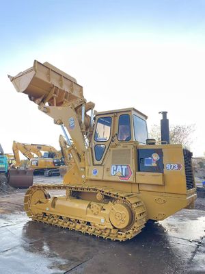 Kolor odfarbowany używany ładowarka Caterpillar 973 w doskonałym stanie