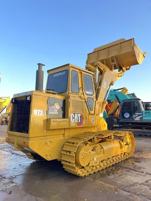 Kolor odfarbowany używany ładowarka Caterpillar 973 w doskonałym stanie