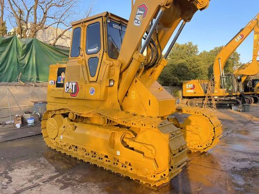 Kolor odfarbowany używany ładowarka Caterpillar 973 w doskonałym stanie