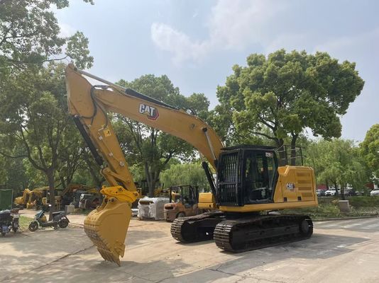 W dobrym stanie używany grabarz Caterpillar 320GC z hydraulicznym klamrem