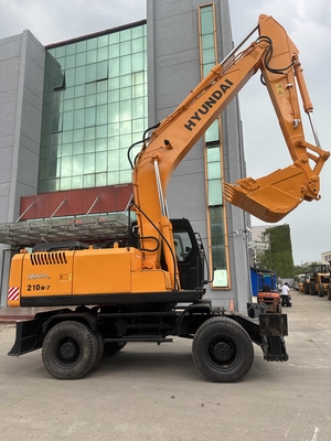 Oryginalny koreański grabarz Hyundai R210W-7 w doskonałym stanie.